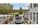 Spacious deck with pergola, seating, and fire pit at 4600 Scottland Dr, Mebane, NC 27302