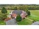 Brick home with a large driveway and yard at 4600 Scottland Dr, Mebane, NC 27302