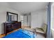Spacious bedroom with a dresser, chair, and large closet at 4600 Scottland Dr, Mebane, NC 27302