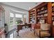 Home office with built-in bookshelves and large window at 4600 Scottland Dr, Mebane, NC 27302