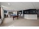 Basement recreation area with pool table and views of the backyard at 4600 Scottland Dr, Mebane, NC 27302