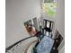 Elegant staircase leading to the main living area at 4600 Scottland Dr, Mebane, NC 27302