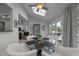 Breakfast nook with glass table, deck access, and skylights at 4600 Scottland Dr, Mebane, NC 27302
