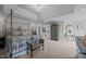 Spacious main bedroom with a large bed, sitting area, and ample closet space at 4600 Scottland Dr, Mebane, NC 27302