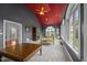 Playroom with vaulted ceiling, large windows, and a trampoline at 4600 Scottland Dr, Mebane, NC 27302