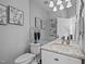 Double vanity bathroom with granite countertop and modern fixtures at 4600 Scottland Dr, Mebane, NC 27302