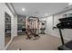 Basement gym with home gym equipment and a mirror at 4600 Scottland Dr, Mebane, NC 27302