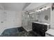 Modern bathroom with a walk-in shower and dark-colored vanity at 4600 Scottland Dr, Mebane, NC 27302