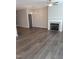 Spacious living area with fireplace and chandelier at 727 Putney Hill Rd, Zebulon, NC 27597
