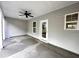 Covered patio with concrete flooring and access to the backyard at 215 Britt St, Smithfield, NC 27577