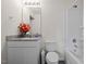Clean bathroom with granite countertop, a white vanity, and a shower/tub combo at 1261 Zoysia Dr, Rocky Mount, NC 27801