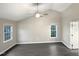 Main bedroom with hardwood floors and vaulted ceiling at 104 Deerwalk Ct, Cary, NC 27513