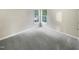 Bright bedroom with neutral carpeting and corner windows at 104 Deerwalk Ct, Cary, NC 27513