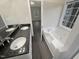 Double vanity bathroom with granite countertop and garden tub at 104 Deerwalk Ct, Cary, NC 27513