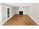 Spacious living room with hardwood floors and fireplace at 104 Deerwalk Ct, Cary, NC 27513