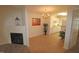 Charming dining area with tile floors, chandelier, and fireplace at 11370 Clubhaven Pl # 103, Raleigh, NC 27617