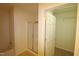 Bathroom with shower, tub, and walk-in closet at 11370 Clubhaven Pl # 103, Raleigh, NC 27617