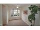 Well-lit bedroom with large window and ceiling fan at 11370 Clubhaven Pl # 103, Raleigh, NC 27617