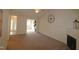 Bright living room featuring a fireplace and access to other rooms at 11370 Clubhaven Pl # 103, Raleigh, NC 27617