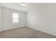 Well-lit bedroom with neutral walls and carpeted floor at 524 Lemon Daisy Ln, Knightdale, NC 27545