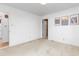 Bedroom with neutral carpeting and wood flooring in hallway at 2509 Mckinney St, Burlington, NC 27217