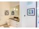 Modern bathroom with dark vanity and glass shower at 515 N Mangum St # 51, Durham, NC 27701