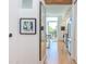 Bright entryway with hardwood floors and view into kitchen at 515 N Mangum St # 51, Durham, NC 27701