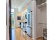 Modern kitchen with stainless steel appliances and light wood floors at 515 N Mangum St # 51, Durham, NC 27701