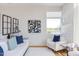 Spacious living area featuring a white sofa and stylish artwork at 515 N Mangum St # 51, Durham, NC 27701
