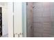 Modern bathroom with a spacious shower and tiled walls at 515 N Mangum St # 51, Durham, NC 27701