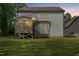 Two-story house with screened porch and deck, surrounded by a grassy lawn at 3613 Legato Ln, Wake Forest, NC 27587