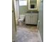 Bathroom with off-white vanity and green walls at 130 S Estes Dr # B-11, Chapel Hill, NC 27514