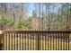 Wooden deck overlooking a private wooded backyard at 671 Legend Oaks Dr, Chapel Hill, NC 27517