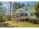 Two story house with a large deck and screened porch at 671 Legend Oaks Dr, Chapel Hill, NC 27517