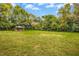 Large grassy backyard with a covered picnic area at 1002 Willow Dr # Apt 7, Chapel Hill, NC 27514