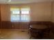 Small dining area with wood table and chairs at 108 Gulf Dr, Dunn, NC 28334