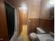 Bathroom with a bathtub and access to another room at 108 Gulf Dr, Dunn, NC 28334