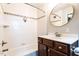 Updated bathroom with a tub/shower combo and modern vanity at 116 Plainview Ave, Raleigh, NC 27604