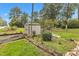 Backyard view with shed and landscaping at 9336 Baileywick Rd, Raleigh, NC 27615