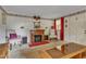 Living room with fireplace and comfortable seating at 9336 Baileywick Rd, Raleigh, NC 27615