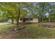 Ranch home with mature landscaping and a spacious yard at 9336 Baileywick Rd, Raleigh, NC 27615