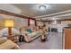 Finished basement with a sitting area and workspace at 9336 Baileywick Rd, Raleigh, NC 27615