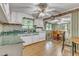 Kitchen with green countertops and wood flooring at 9336 Baileywick Rd, Raleigh, NC 27615