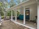 Charming patio with string lights and outdoor furniture, adjacent to a house at 1021 Dimmocks Mill Rd, Hillsborough, NC 27278