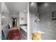 Bathroom with soaking tub, walk-in shower, and stylish rug at 1021 Dimmocks Mill Rd, Hillsborough, NC 27278