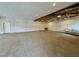 Open area with polished concrete floor and string lights at 1021 Dimmocks Mill Rd, Hillsborough, NC 27278
