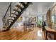 Elegant dining room with hardwood floors and modern chandelier at 1021 Dimmocks Mill Rd, Hillsborough, NC 27278