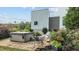 Hot tub on patio with seating area and landscaping at 1021 Dimmocks Mill Rd, Hillsborough, NC 27278