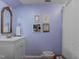 Clean bathroom featuring a vanity and decorative wall art at 1021 Dimmocks Mill Rd, Hillsborough, NC 27278