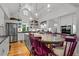 Modern kitchen with island, stainless steel appliances, and open shelving at 1021 Dimmocks Mill Rd, Hillsborough, NC 27278